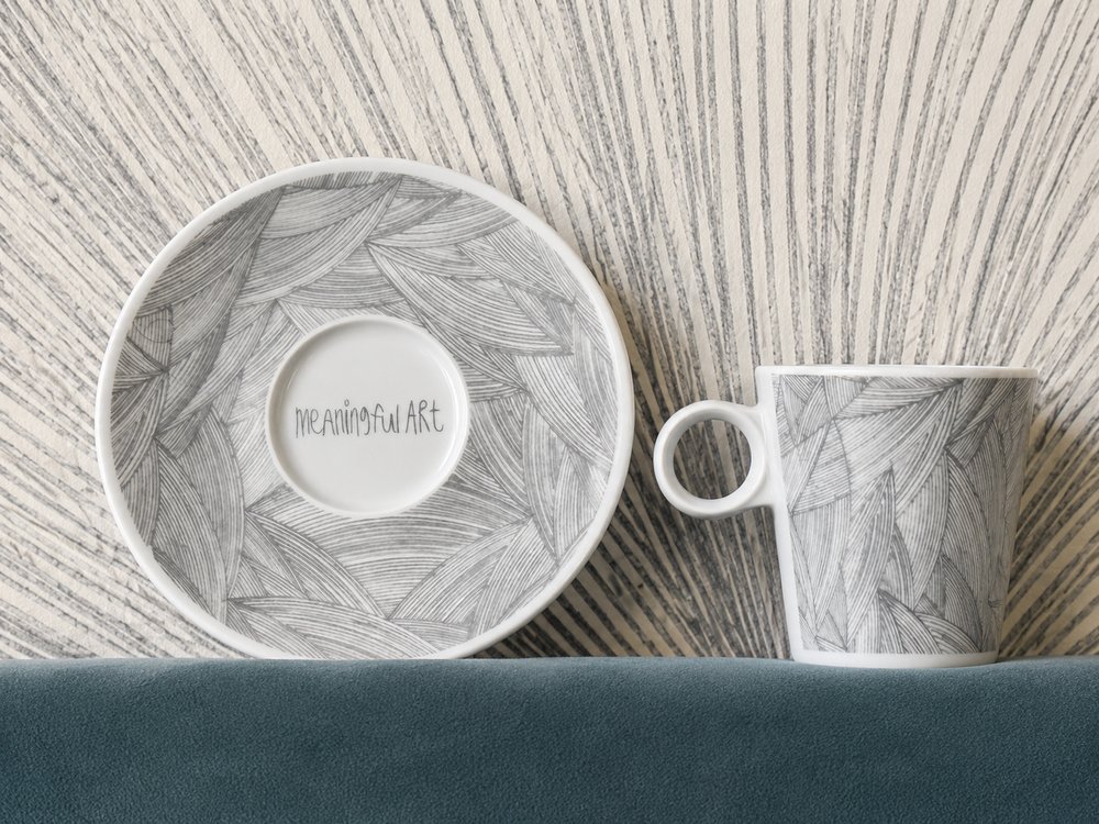 Hand-illustrated coffee cups echoing the same geometric motif hand-drawn by the family's autistic son, used as wallpaper throughout the apartment, pied-à-terre Kipsala Riga — Ruimte interior design